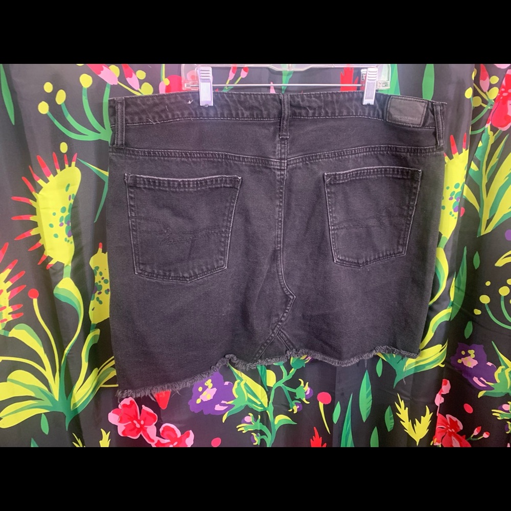 Dark grey jean distressed mini skirt American Eagle